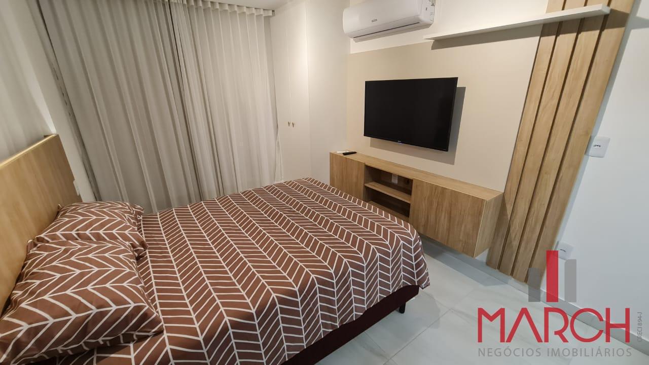 dormitrio com ar condicionado e TV