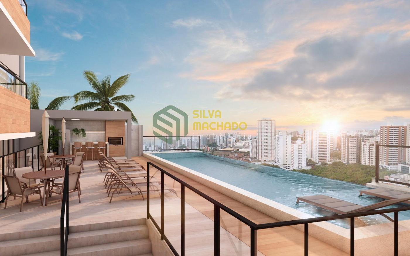 Piscina com borda infinita e deck