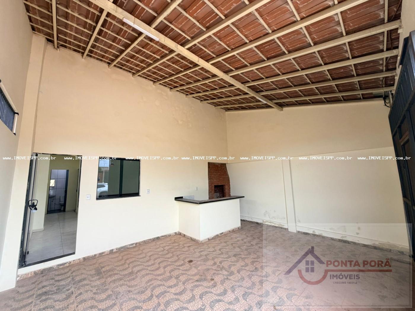 Área de churrasqueira e garagem
